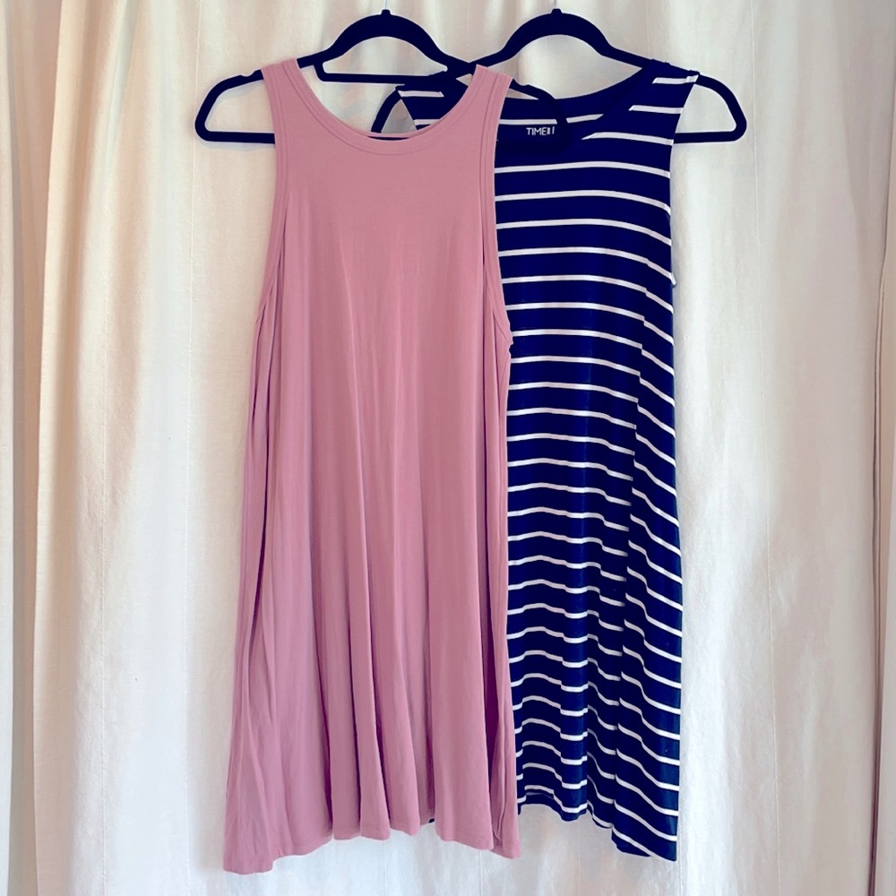 TWO sleeveless dresses